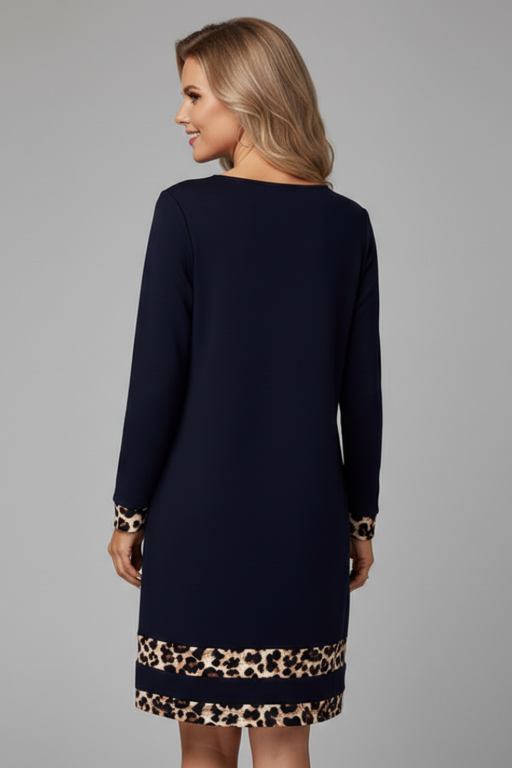 Women’s short dress with round neckline and long sleeves