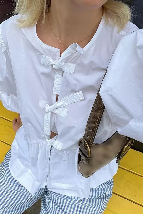 Button-Down Peplum Blouse with Bow Accents