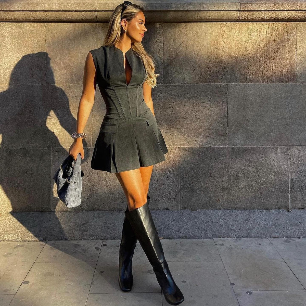 Women’s Mini Dress with Pleated Skirt and Plunge Neckline