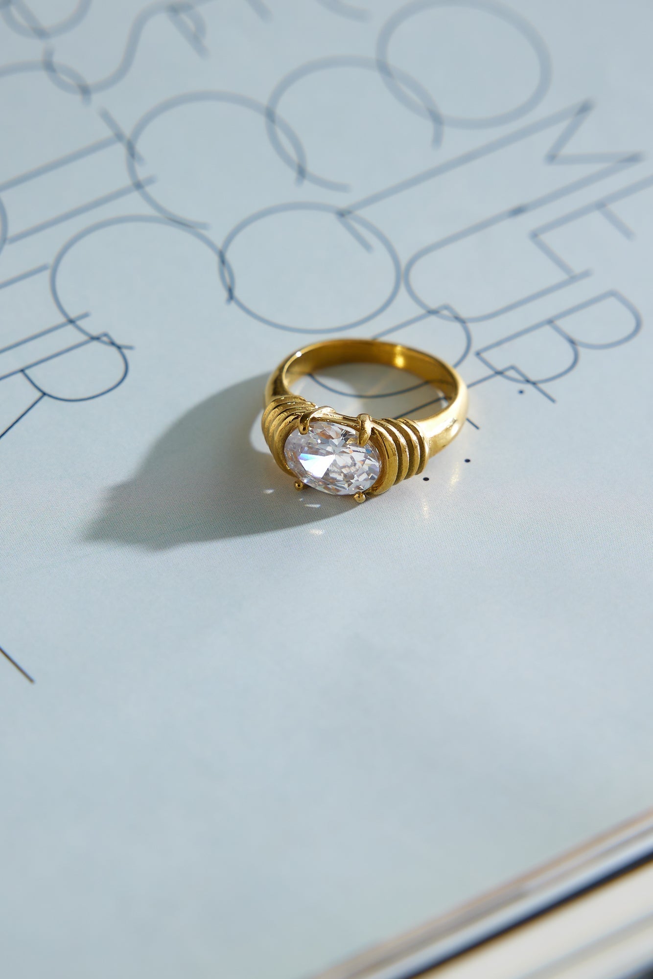 Sparkling Gold Ring with Cubic Zirconia and Wrap Detail for Women